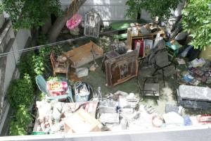 Using the backyard for insurance-claim items.